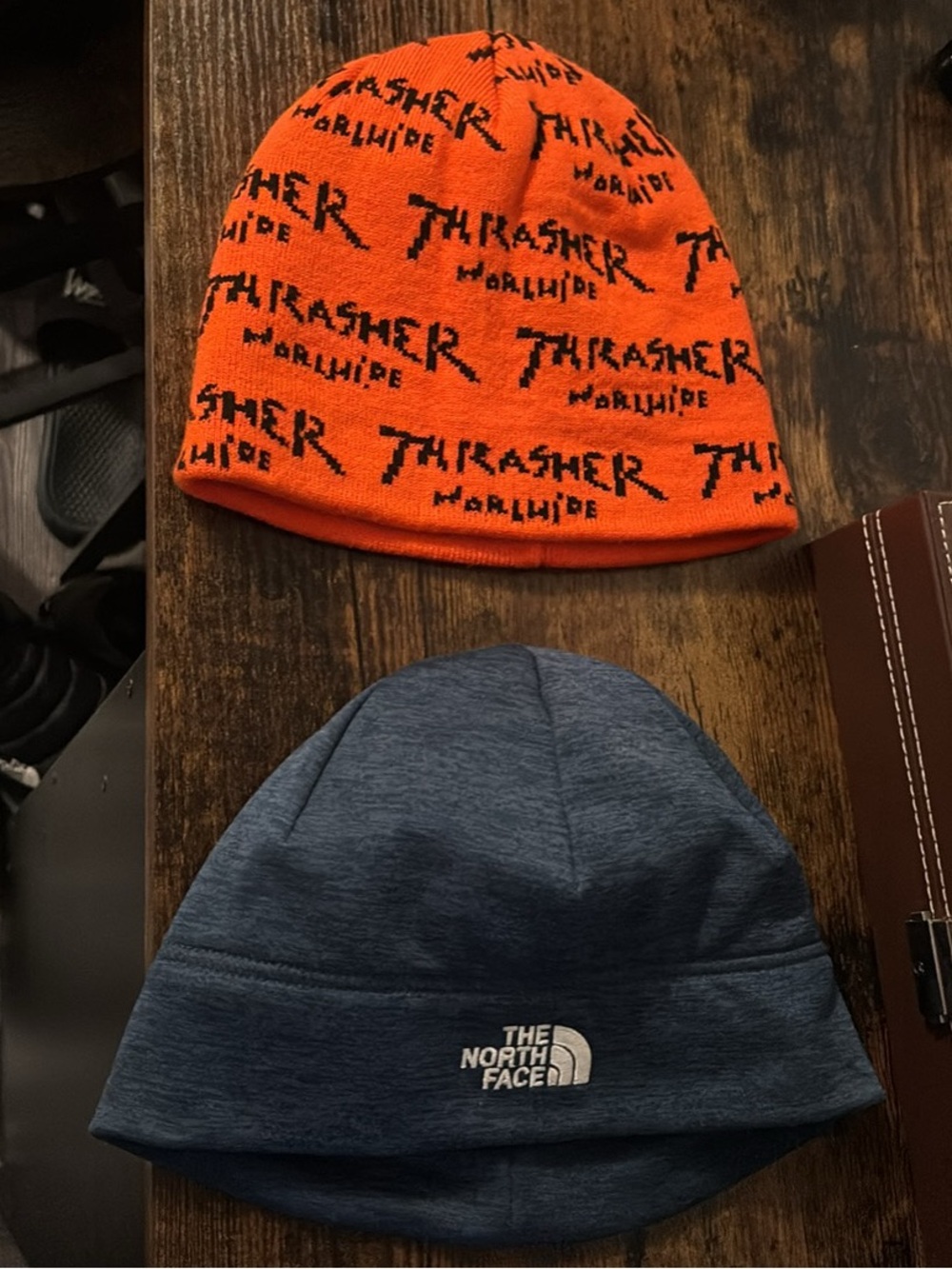 Thrasher and TNF beanies